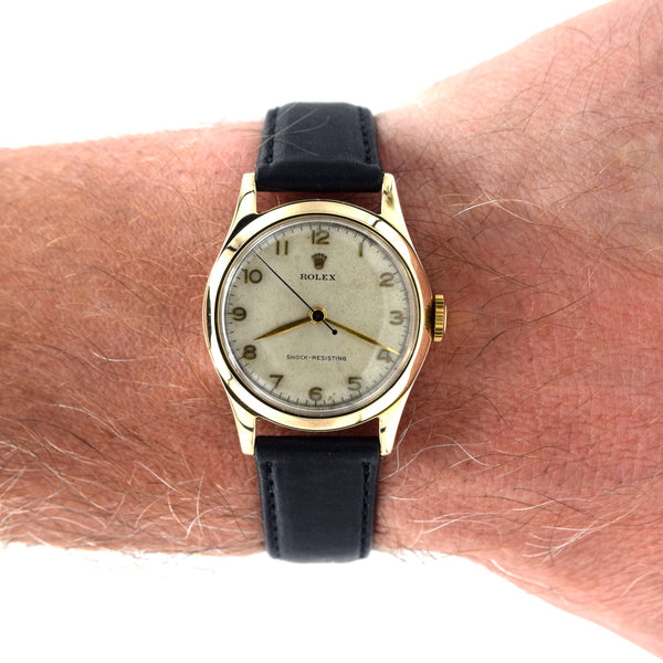 1953 Rolex Classic Dress Wristwatch in Solid 9ct Gold with Patina Arabic Dial in 30mm Unisex