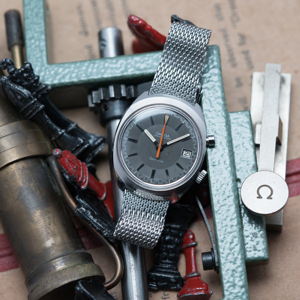 1969 Omega Chronostop Genéve Date Model 146.009 with Grey Dial in Stainless Steel on omega mesh bracelet