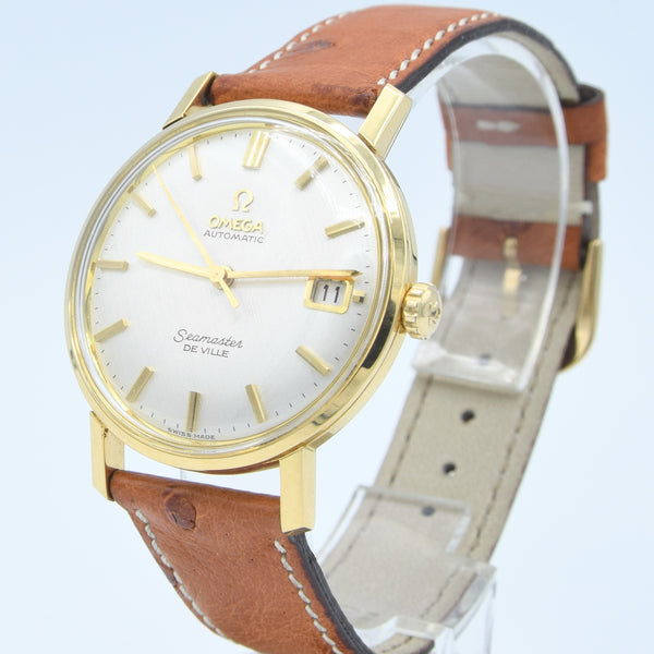 1963/64 Omega Automatic Seamaster De Ville Date Model 166.5020 in Solid 18k Gold with Linen Dial