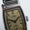 1930s Rotary Deluxe Deco Tonneau Wristwatch Early Waterproof Patent with Arabic Numerals and Bakelite Box