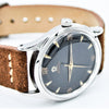 1947 Omega Early Bumper Automatic with Rare Patina Black Dial Model 2582 in Stainless Steel