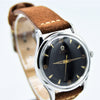 1947 Omega Early Bumper Automatic with Rare Patina Black Dial Model 2582 in Stainless Steel