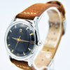 1947 Omega Early Bumper Automatic with Rare Patina Black Dial Model 2582 in Stainless Steel