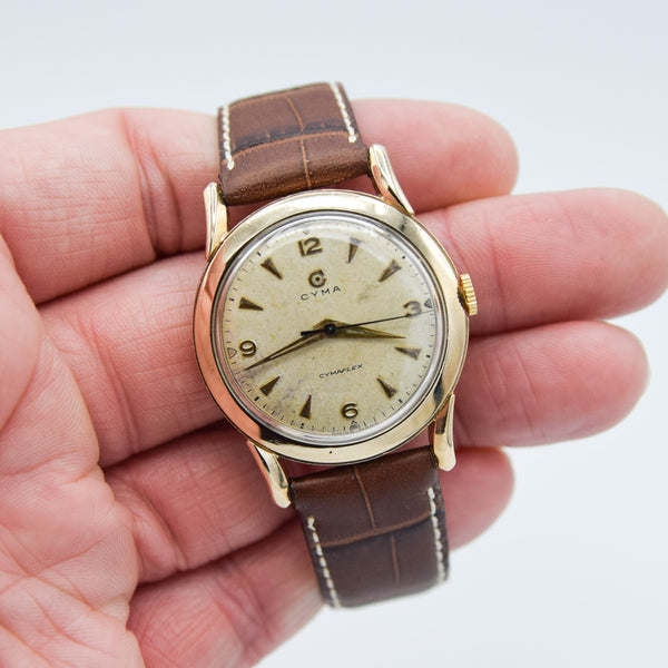 1954 Cyma Cymaflex Wristwatch Bombe Style Lugs and Mixed Arabic and Arrow Batons in Solid 9ct Gold with Original Box