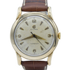 1954 Cyma Cymaflex Wristwatch Bombe style lugs with mixed Arabic Dial arrow batons in solid 9ct Gold with Original Box